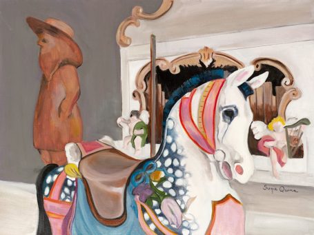 Colorful carousel horse with ornate decorations beside a wooden bear statue.