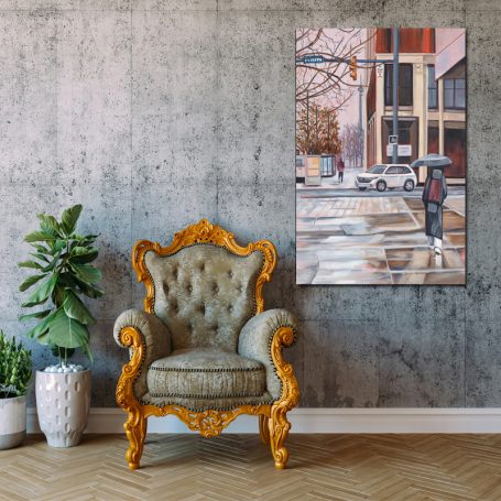 A stylish armchair in a modern room with a street scene painting and a potted plant.