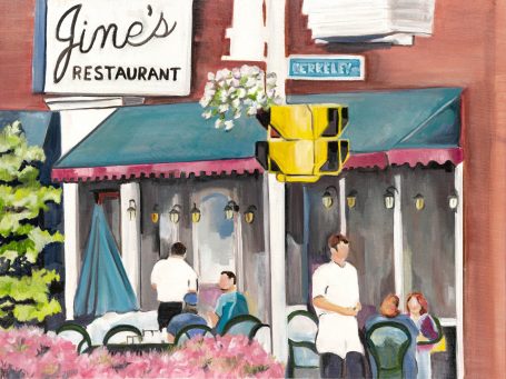 Exterior of Jim's Restaurant with outdoor seating and a traffic light nearby.