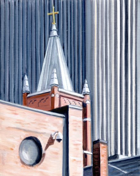 Roofline of a church with a cross, juxtaposed against a modern building.